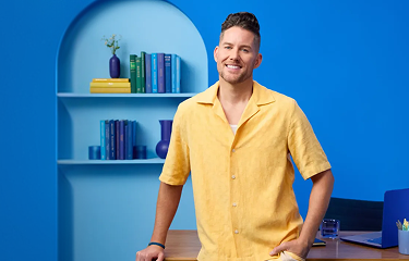 Burton Buffaloe standing in front of a desk. Real ZAVZPRET® patient.